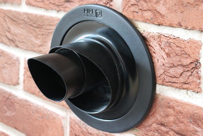 Boiler flue terminal on an outside brick wall