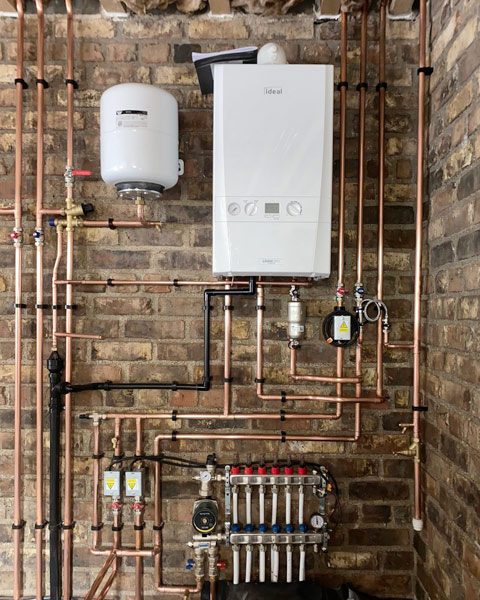 Ideal boiler with an underfloor heating manifold