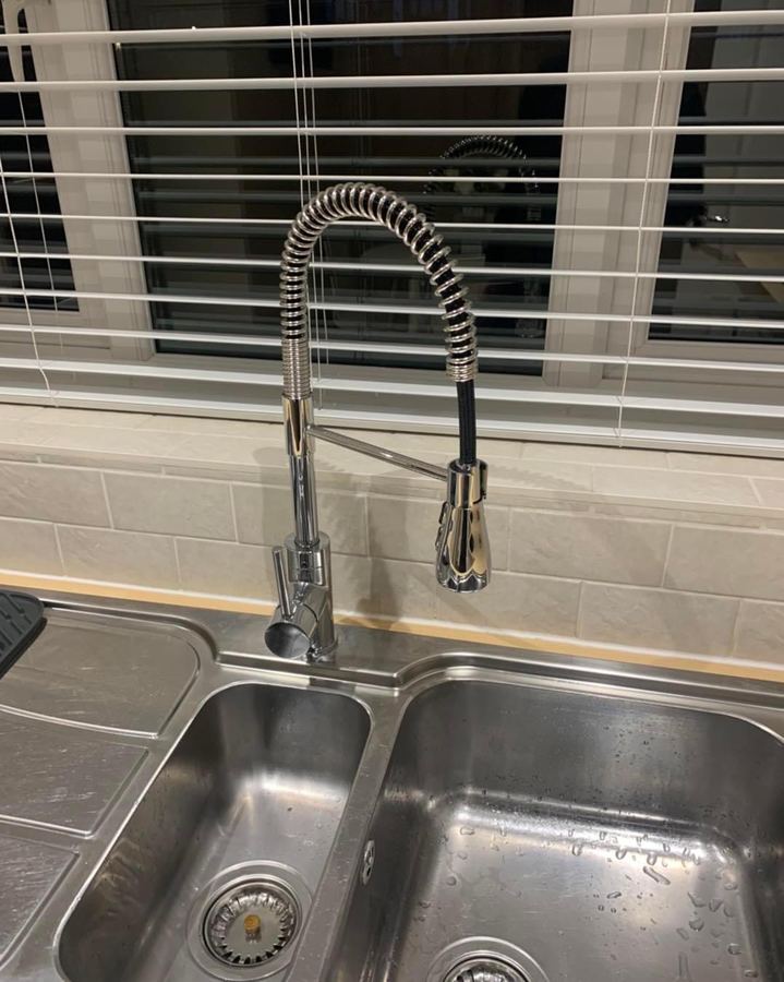 Chrome pull-down kitchen mixer