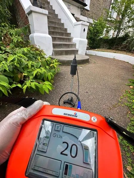 Acoustic leak survey on the path outside a London house