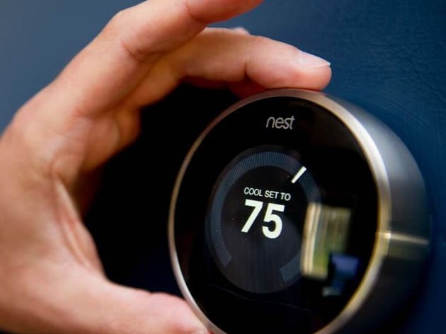 Adjusting the temperature on a Nest Learning Thermostat
