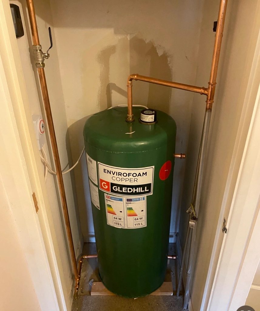 Gledhill Envirofoam copper vented cylinder in an airing cupboard