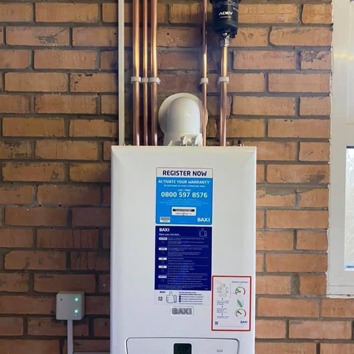 Combi boiler on exposed brick